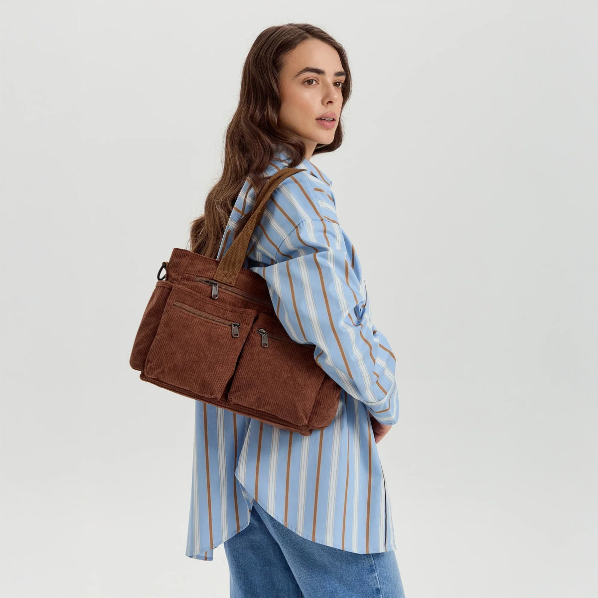 Kanna corduroy crossbody bag with adjustable strap and zippered pockets
