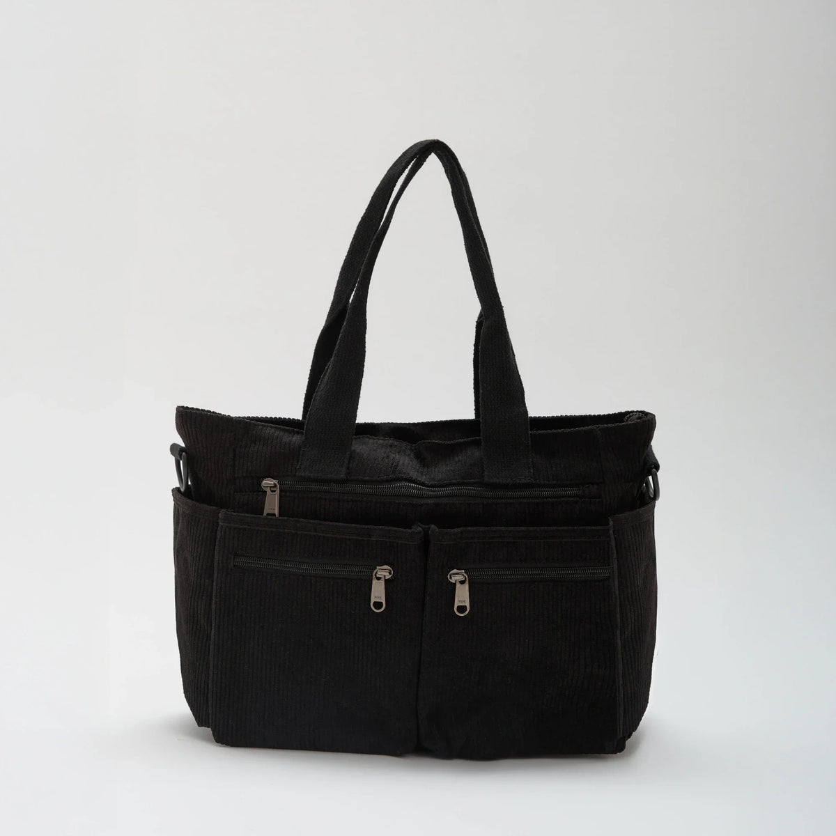 Bolso Carla de pana en negro con correa ajustable